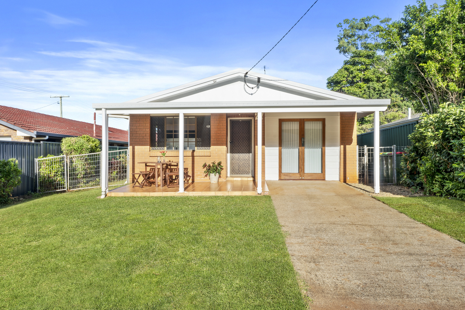 Aerial view of modern homes with solar panels - Professional Property Management
