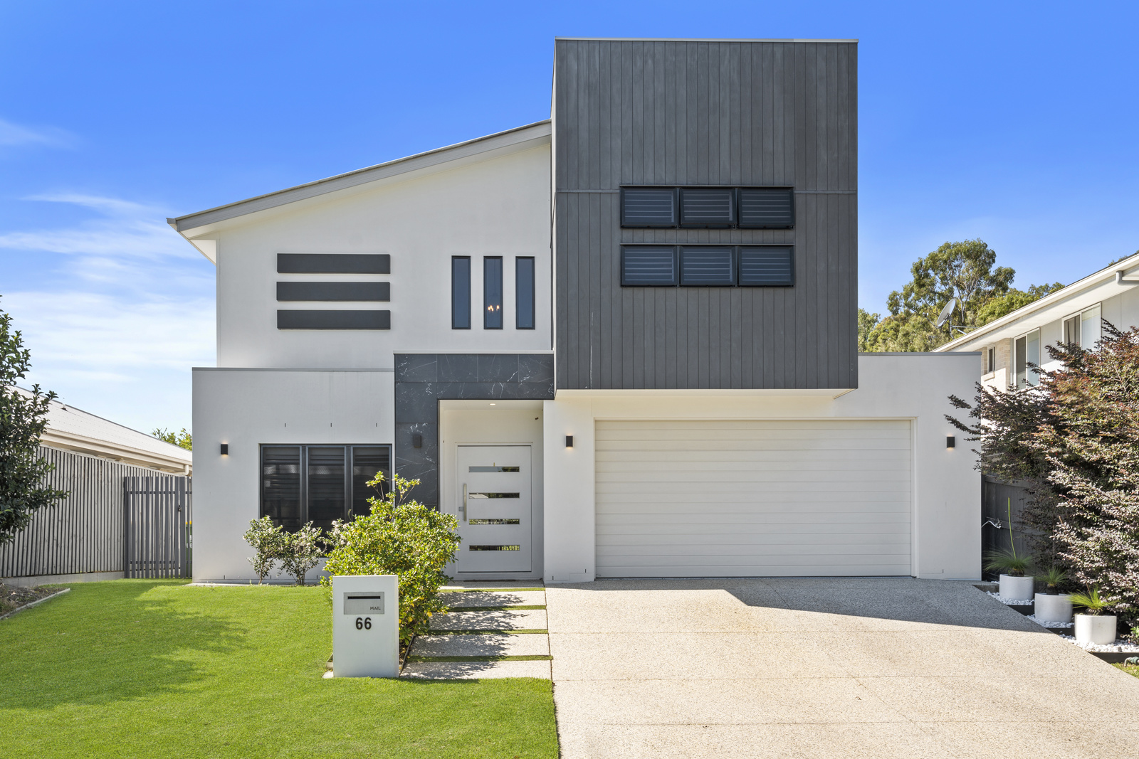 Beautiful lakefront home with professional landscaping - Expert Property Management